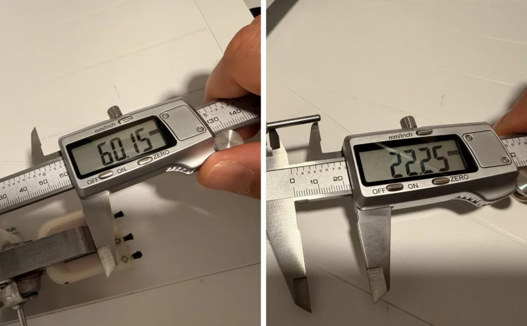 Two caliper readings on the microwave fan motor: 60.15 mm across the frame and 22.25 mm across the mounting part