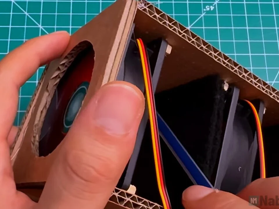 Pencil marking a line inside the box in front of the carbon filter