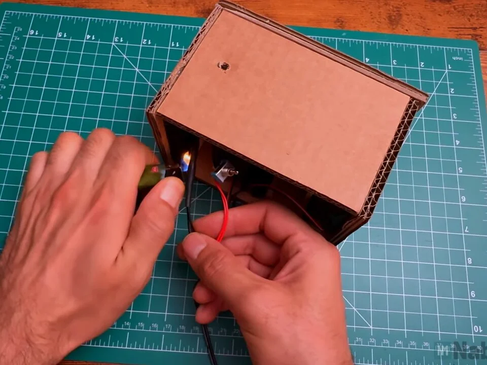 Insulating a wire joint at the switch with heat while the power lead exits the box